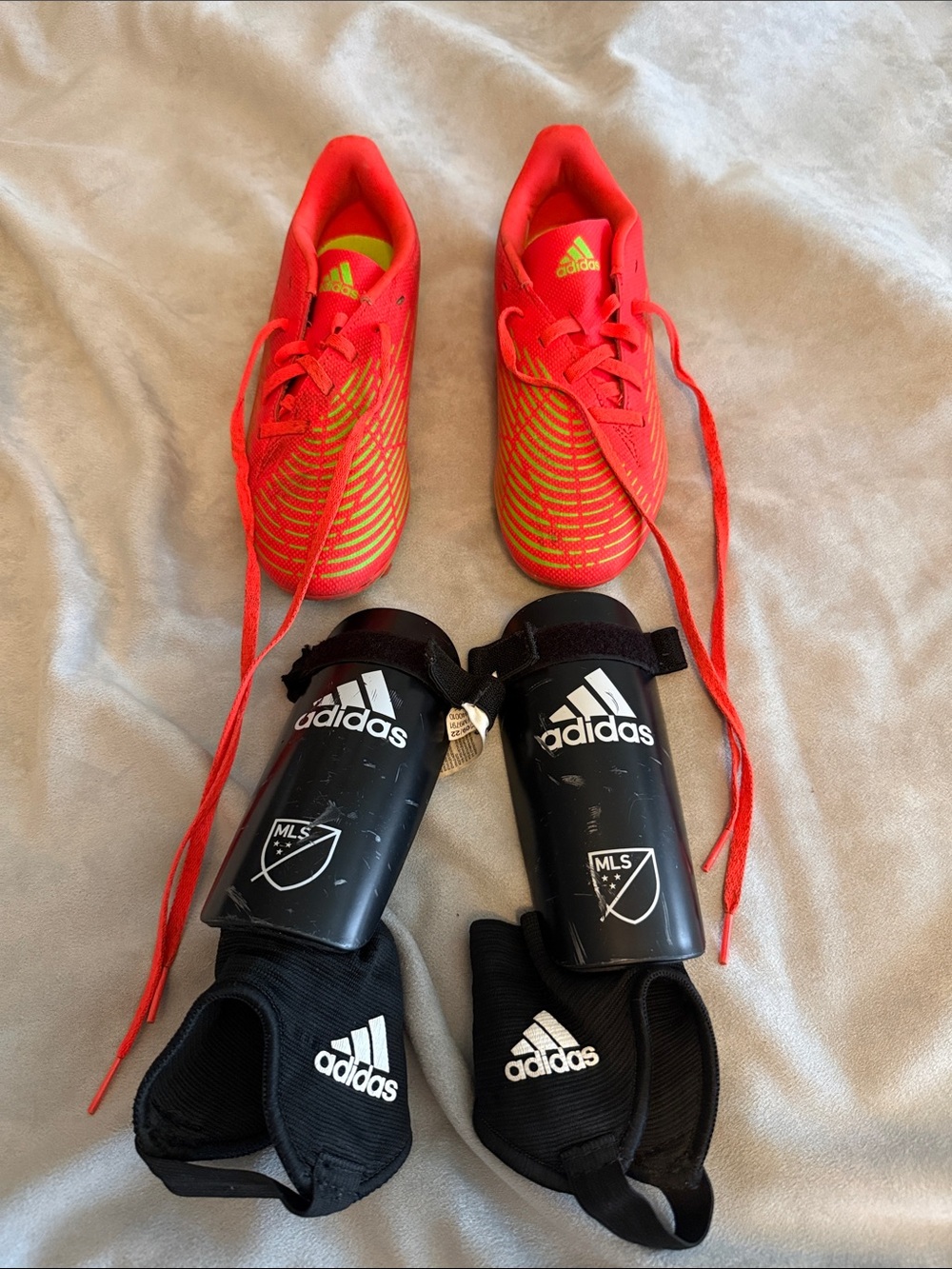 Adidas Predator Orange Youth Soccer Cleats and M shin guards (Size US 4)